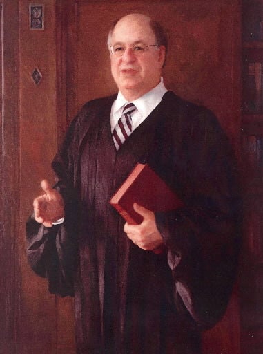 John A. Wolf appointed presiding judge